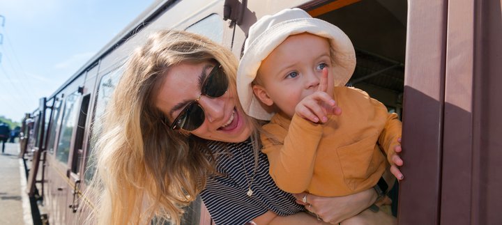 Woman and baby riding Heritage Train