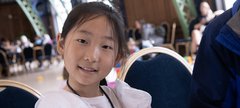 smiling girl does crafts
