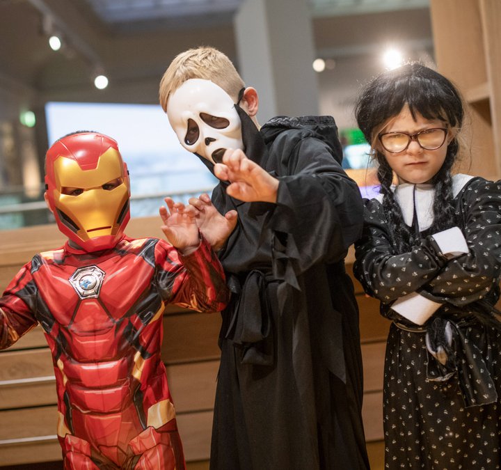 Children in Halloween fancy dress at a museum