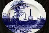 Cumbrian Blue(s), Sellafield No:9, 5/5. Transfer print collage on bone china platter with platinum, 410mm x 345mm x 24mm. Paul Scott 2005.