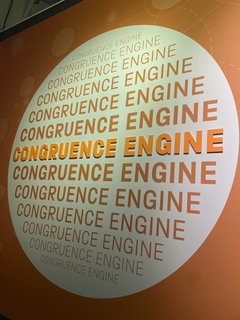 Orange wall with text: The Congruence Engine 