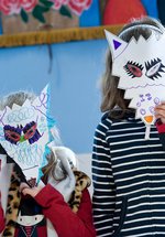 two girls in wolf masks they made
