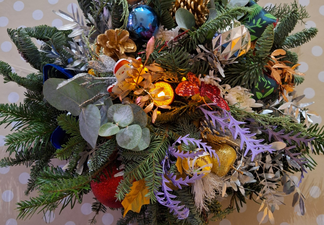 A floral bouquet with a variety of colourful flowers.