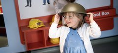 Small girl in old helmet 