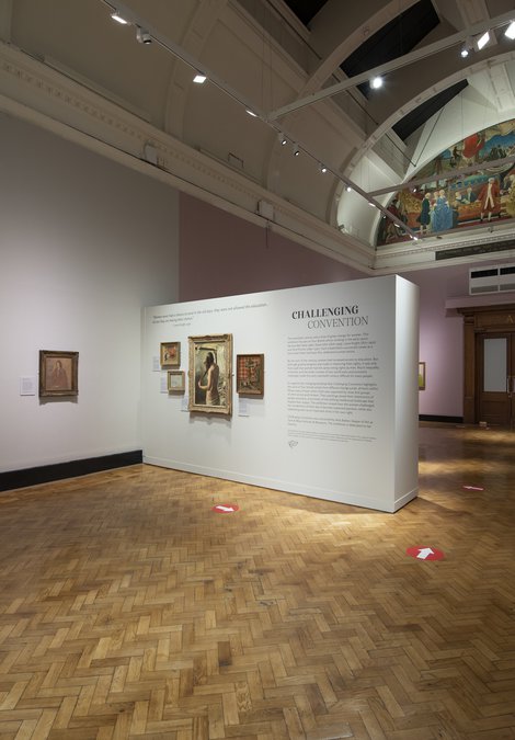 installation photo of Challenging Convention showing pink and white walls with paintings by artists Gwen John, Vanessa Bell, Laura Knight and Dod Procter