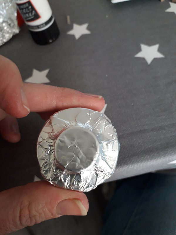 Bottle top covered in silver foil