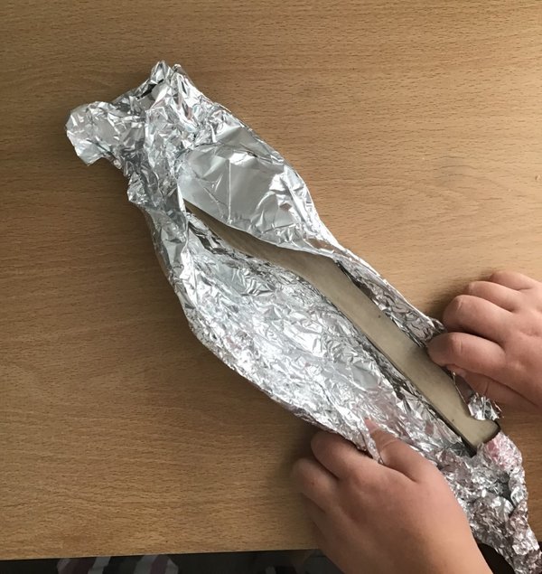 Wrap spoon in foil