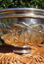 Silver cup showing detail of laurels