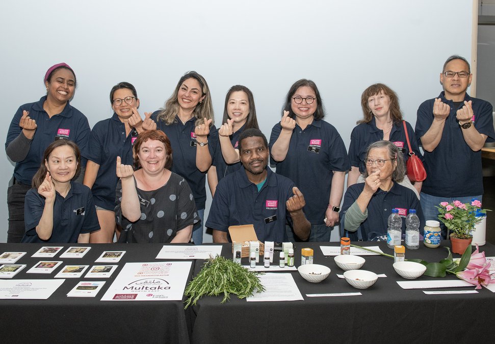 Group photograph of museum volunteers who have migration backgrounds