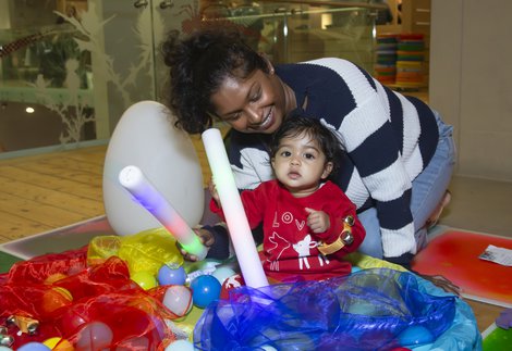 A woman and a baby are in the Great North Museum: Hancock