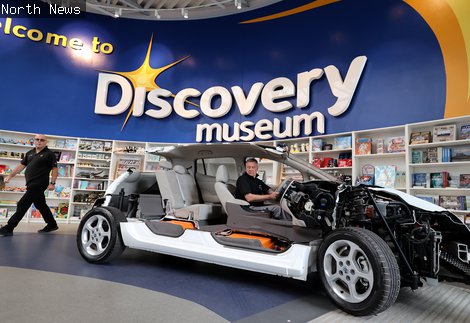 NISSAN staff drive the cutaway Leaf into Discovery Museum