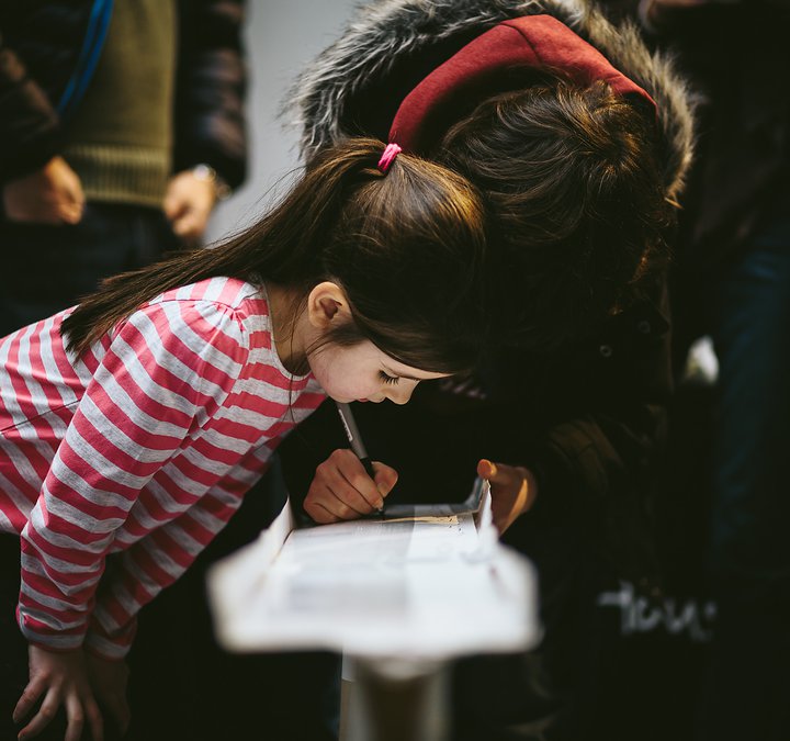 girl engrossed in building