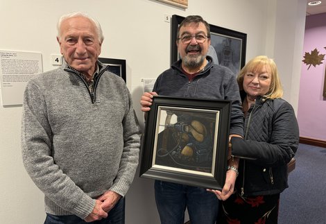 Bob Olley and raffle winner Mick Curry with wife Liz Curry