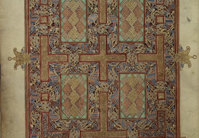 Photo: carpet page from the Lindisfarne Gospels. It is a highly detailed page with a cross pattern embedded in its design.
