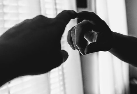 Hand reflected in mirror