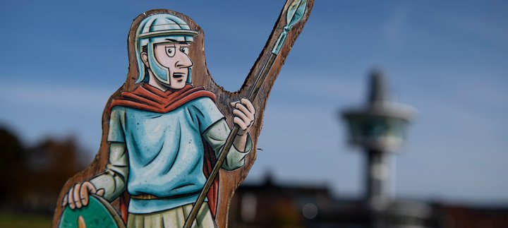 Roman trail character with viewing tower in the background
