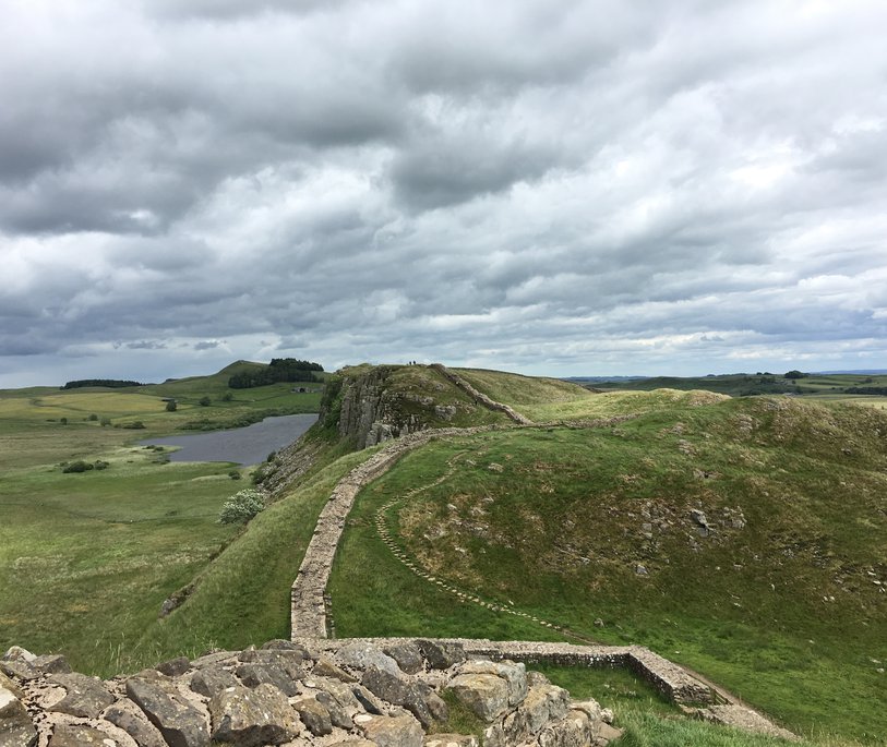 An image across fields and along a section of Hadrian's wall