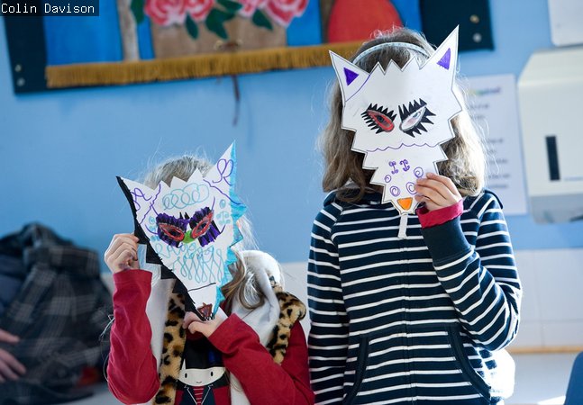 two girls in wolf masks they made