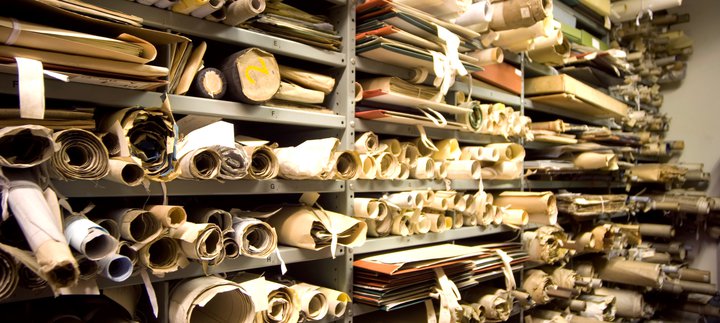 shelves full of large scrolls 