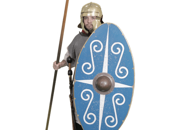Man dressed as a Roman soldier with helmet, long spear and blue oval shield