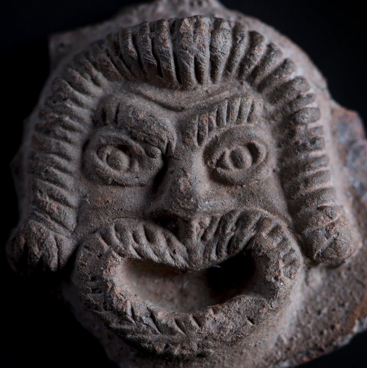Face carved in stone