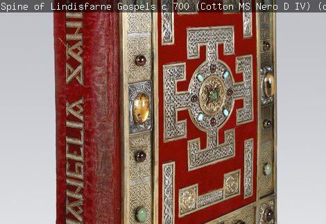 Spine and cover of the Lindisfarne Gospels book, red with gold decoration