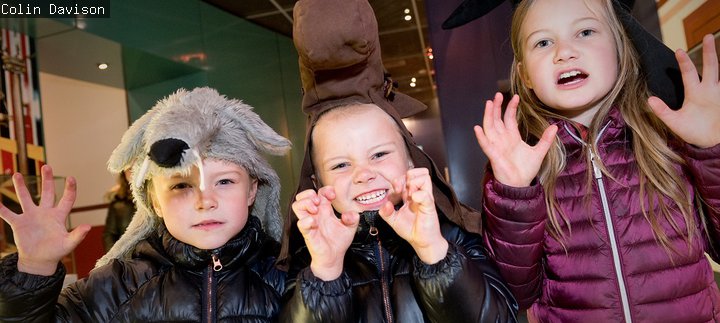 Kids in Halloween hats 