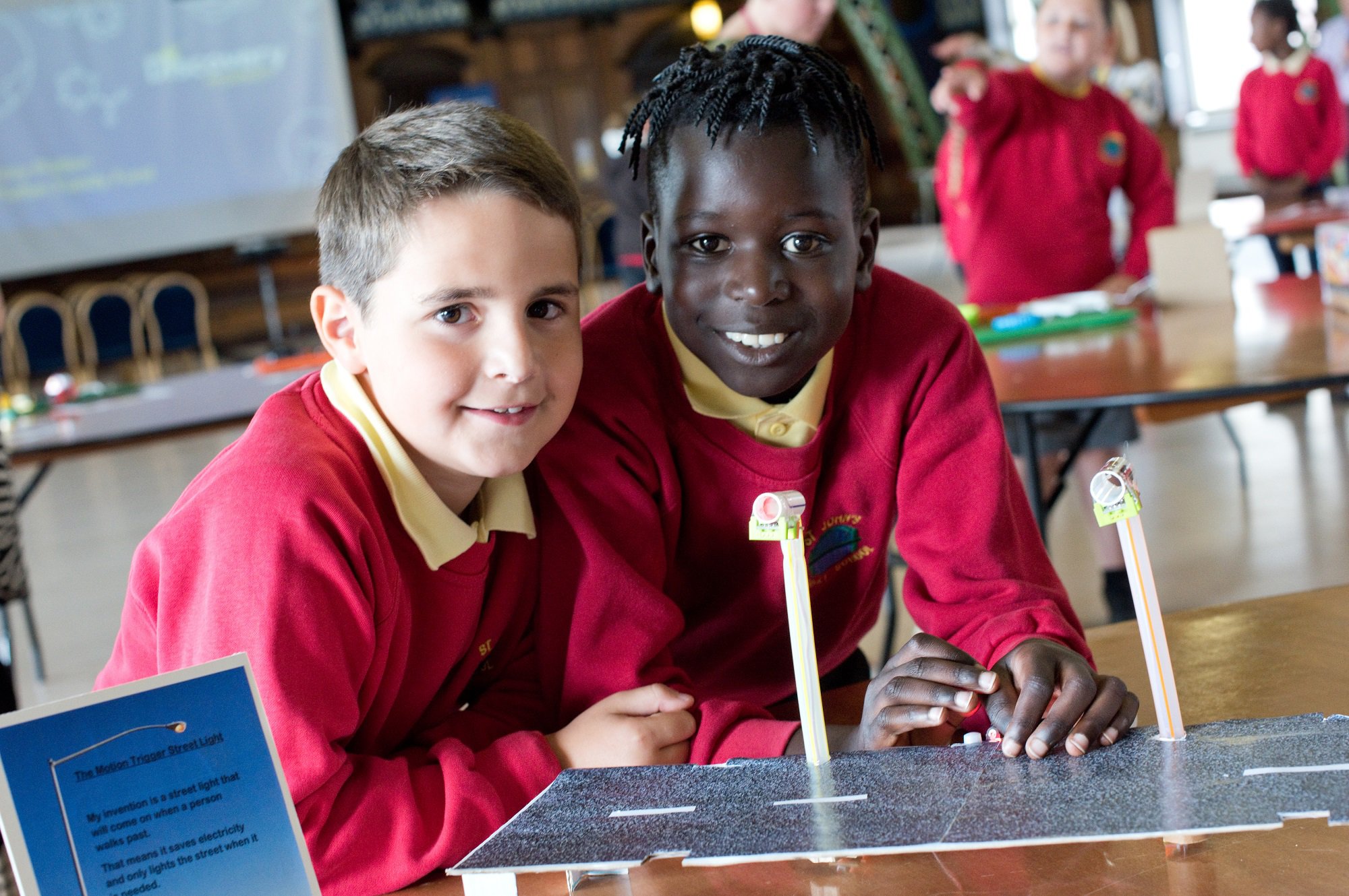 Two schoolchildren at a museum workshop Two schoolchildren at a museum workshop