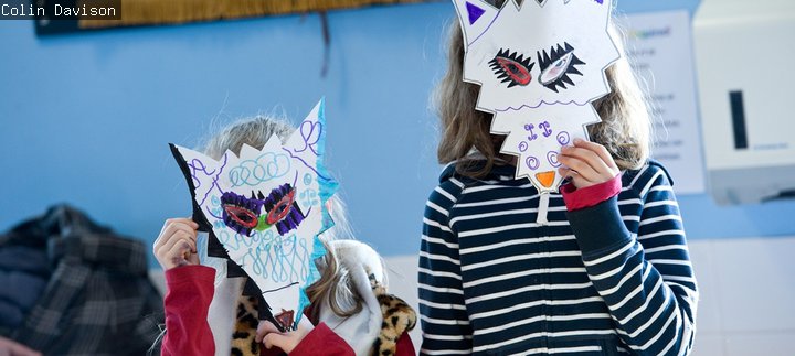 two girls in wolf masks they made