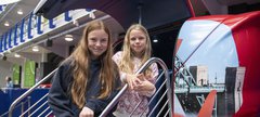 two sisters at Red Arrows simulator
