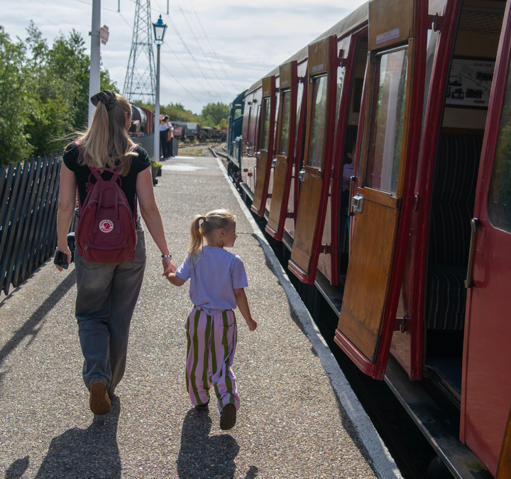 Mother and child at railway