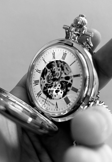 Black and white photo of pocket watch