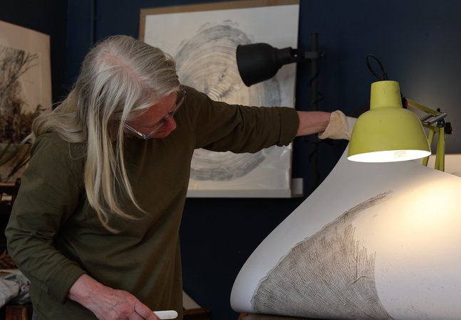 Printmaker Shona Branigan printing 'Knowledge', one of the five Heartwood prints she created © Shona Branigan.jpg