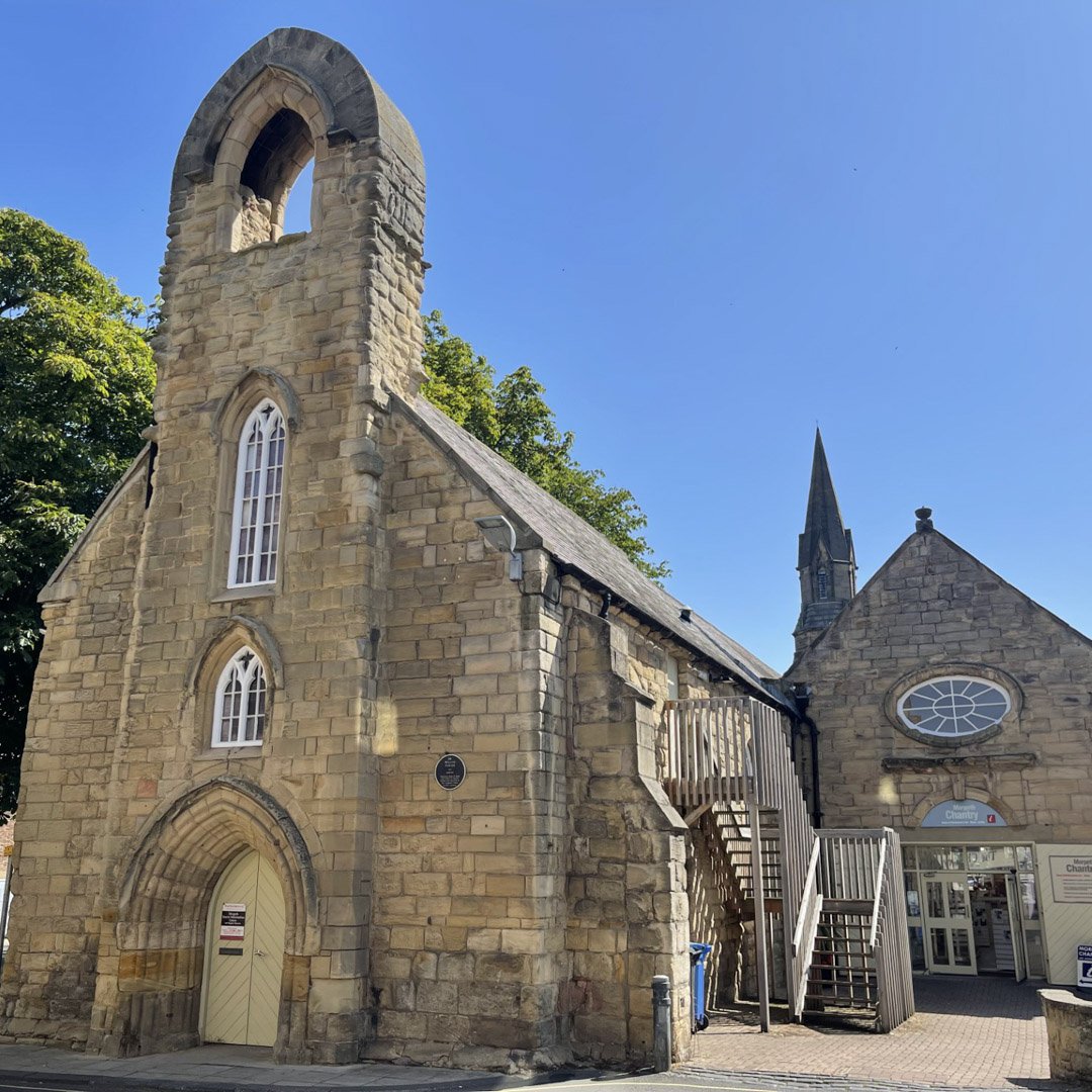 A stone building that resembles a church.
