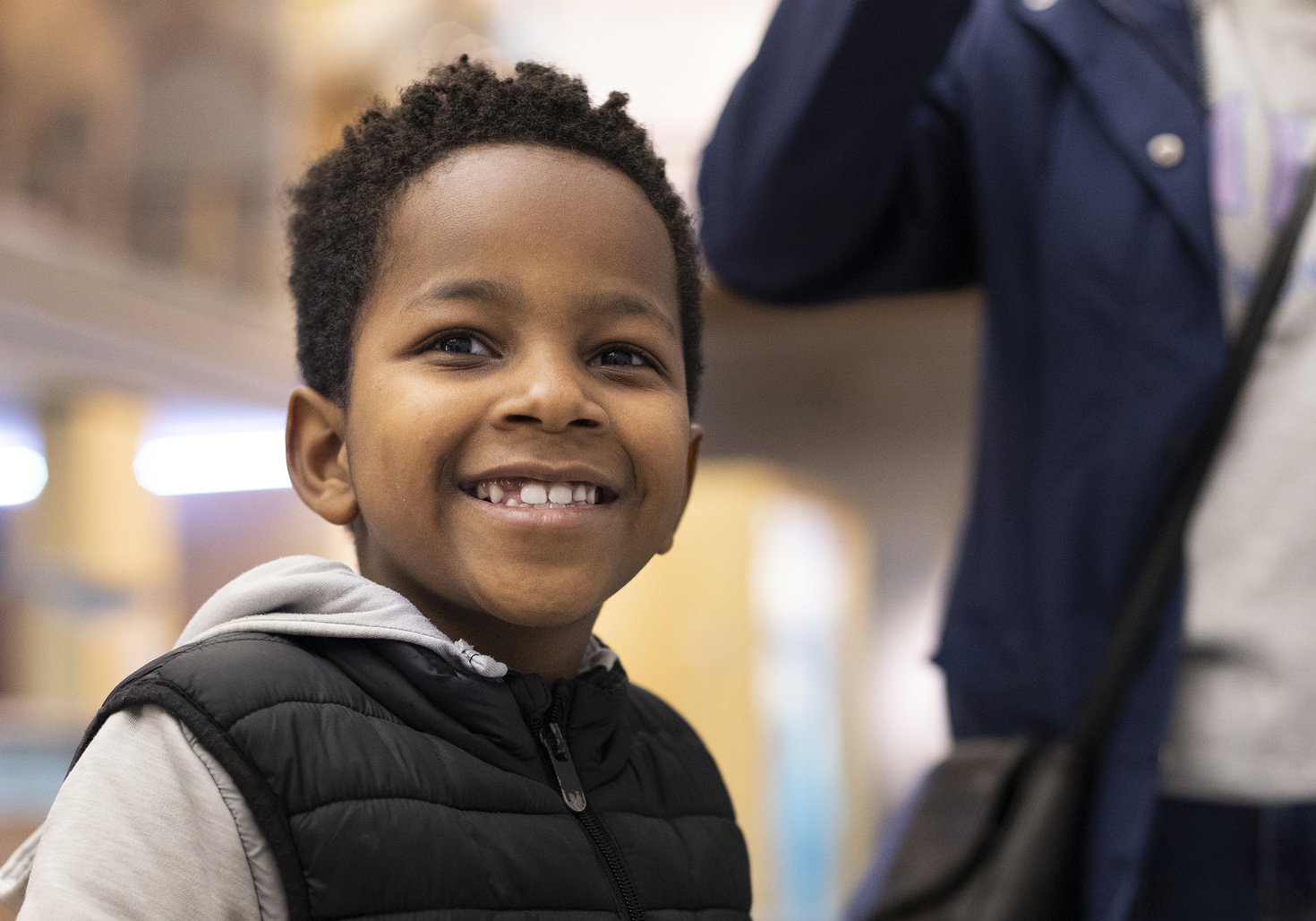 A boy smiles