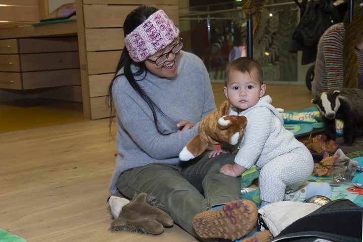 A baby with an adult