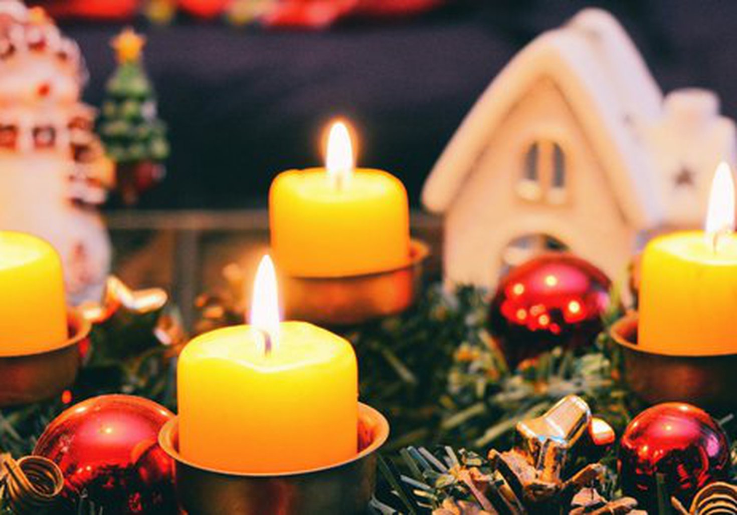 A festive display of greenery and candles