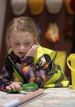 A young child in the Treasure exhibition