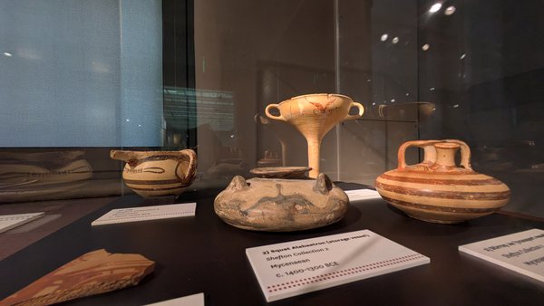 A selection of Mycenaean objects in a case A selection of Mycenaean objects in a case