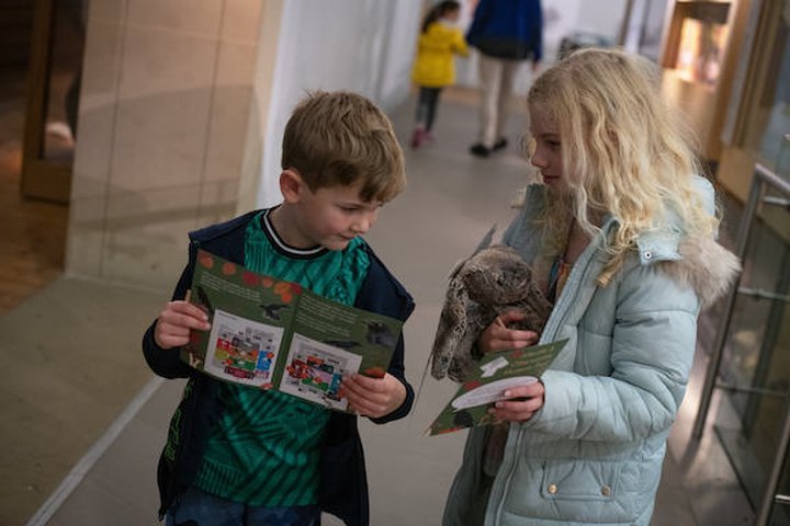Two children doing a museum trail 