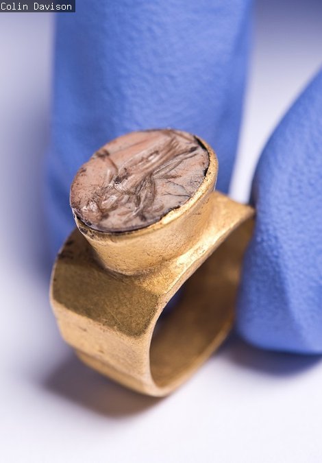 A gold ring with gem engraved with Roman goddess Fortuna