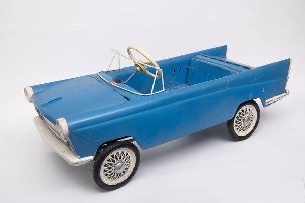  blue toy pedal car circa 1950s