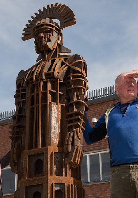 hikers with centurion sculpture