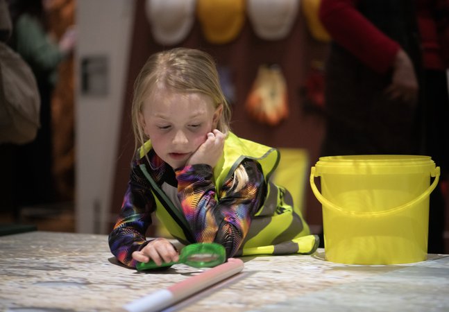 A young child in the Treasure exhibition