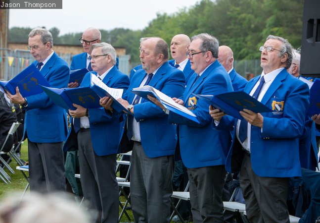 Ashington & District Male Voice choir singing at Woodhorn Museum