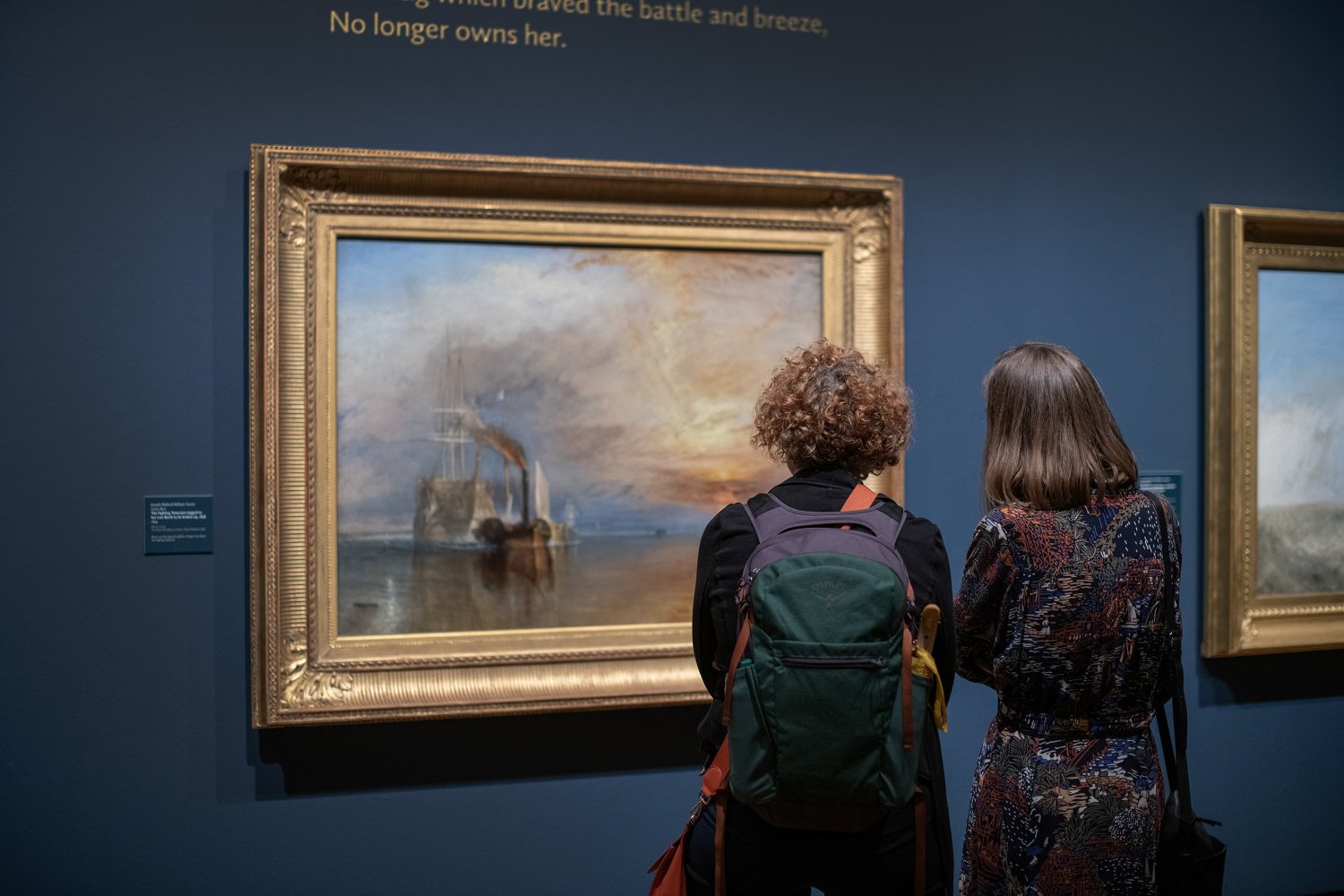 Two visitors to the Laing Art Gallery looking at Turner's 'The Fighting Temeraire'