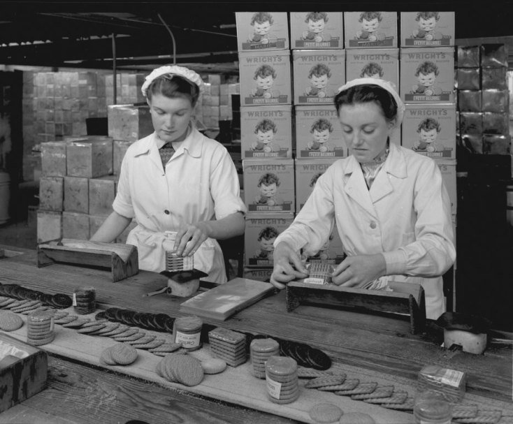two women are preparing Wright's Biscuits. Photograph taken by Turners Photographic of Newcastle. Wright’s Biscuits was a well known company in South Shields two women are preparing Wright's Biscuits. Photograph taken by Turners Photographic of Newcastle. Wright’s Biscuits was a well known company in South Shields