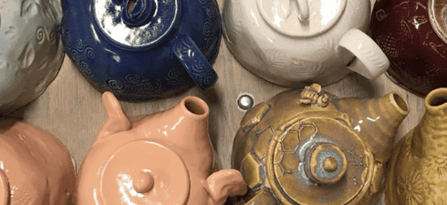 teapots on a table