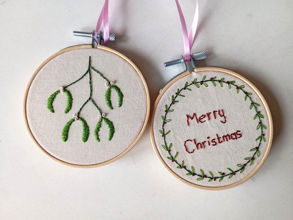 Embroidered hoops with mistletoe and Merry Christmas message Embroidered hoops with mistletoe and Merry Christmas message