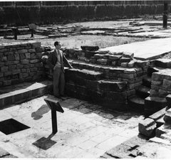 A man stands inside a fort 